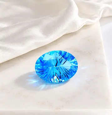 Beautiful concave cut blue topaz gemstone
